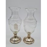 Pair of silver bottomed glass vases. Weight 490g, 18cm tall.