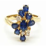 18ct Yellow Gold Cross Over Diamond and Sapphire Ring, Ring Size K, Weight 5.8g