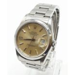 Rolex Oyster perpetual datejust gents watch 1993 with gold face and steel strap, 36mm case. In
