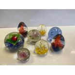 8 Paperweights in various colours and sizes. Colours are clear and vivid, no damage to the glass.