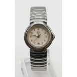 Ladies Dunhill watch with metal strap. Face width 2.9cm.