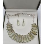 A fabulous Rutilated Quartz necklace and matching earring set in a presentation box. Necklace