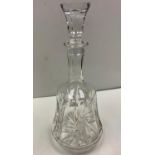 Antique cut glass decanter with wide base, star spiral design on side. Width 13.5cm, Height 30cm.
