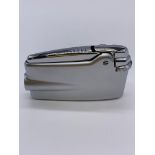 Vintage Ronson Varaflame in brushed stainless steel and having logo for British United Airways.