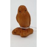 Perched wooden bird with detailing