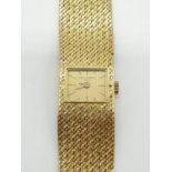 Vintage Patek Philippe 18ct solid gold ladies watch, 18mm case, length 15.5cm , weight 51.8g.