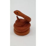 Wooden coiled red python (2.5 inches height) (2.0 inches wide)