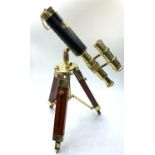 A highly ornamental, modern, brass, replica of an Edwardian telescope, on a mahogany and brass