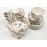 Vintage Children's China Tea Set featuring 6 cups, 6 saucers, 6 plates, sugar bowl and teapot.