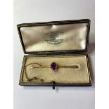 Late 19th Early 20th century. 15ct gold and amethyst bar brooch. Having large oval amethyst to