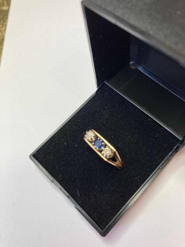 9ct Gold Three Stone Ring having Centre Sapphire with diamond point to each side. Modernist mount