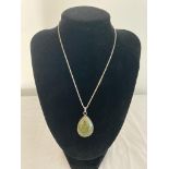 Silver box chain and pendant. Pendant having large green agate stone in pear shaped silver mount.