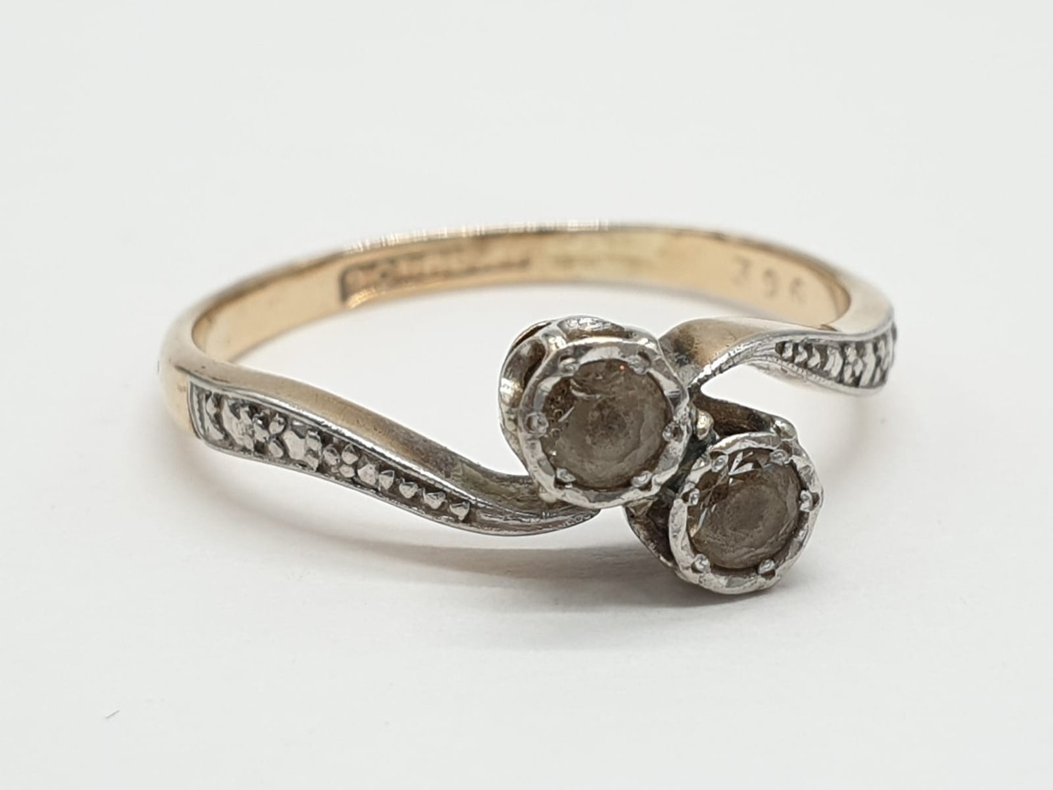 9ct Gold and platinum ring having two pale aqua stones to top in crossover style. Preserved in - Image 3 of 7