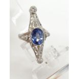 1940's art deco style ring with 4.50ct sapphire centre and 1ct diamonds approx, set in white gold (