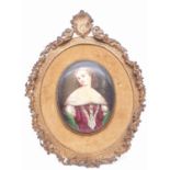 An 18th century porcelain miniature of an Ermine wearing lady in ornate frame, 8x6cm