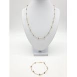 14ct gold brown diamond and pearl necklace with matching bracelet, total weight 5.6g and over 9ct