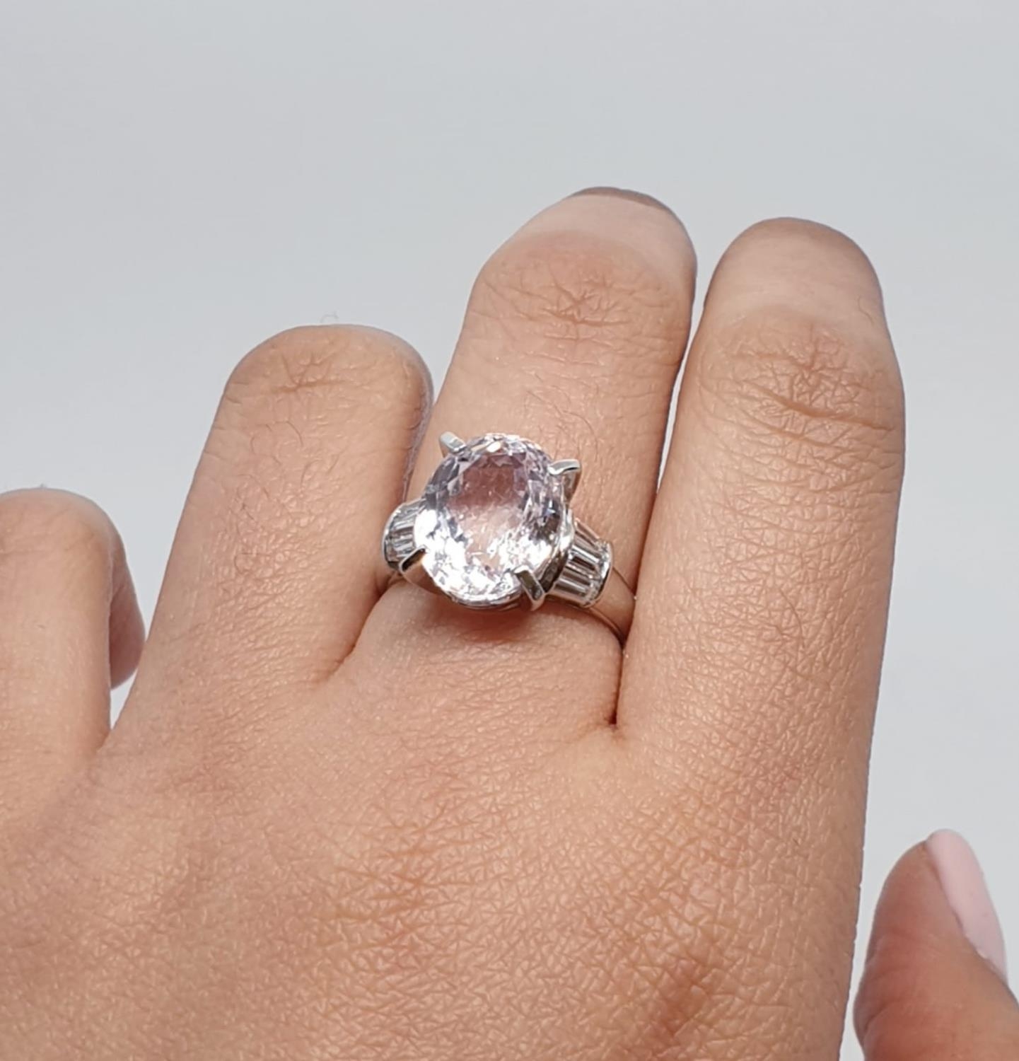 Platinum ring with a large 7.24ct cognizant stone centre and 0.64ct diamonds on shoulders, weight - Image 11 of 13