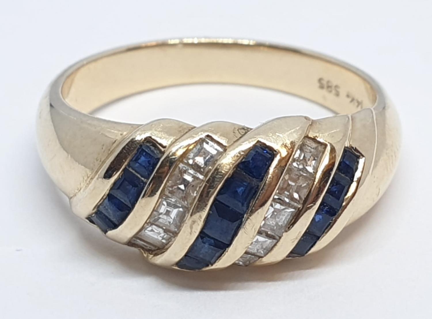 14ct Yellow gold diamond and sapphire ring. Weight 4.2g, Size N.