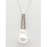 South Sea Pearl PENDANT with diamonds and platinum on 9ct gold chain. 8.3g 42cm