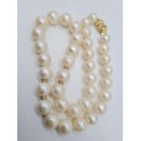 Set of graduated south sea pearl necklace set in 14ct gold and diamond clasp, weight 81.7g and