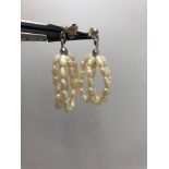 freshwater pearl earrings set in silver