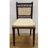 One dark oak nursing chair. Late 19th century, recently recovered with tasteful flower design