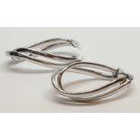 9ct White gold twist oval shaped hoop earrings. Weight 1.5g, Length 2.4cm.