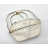 Vintage Gucci styled cream canvas crossbody bag with cream leather strap. Interior zipped pocket.