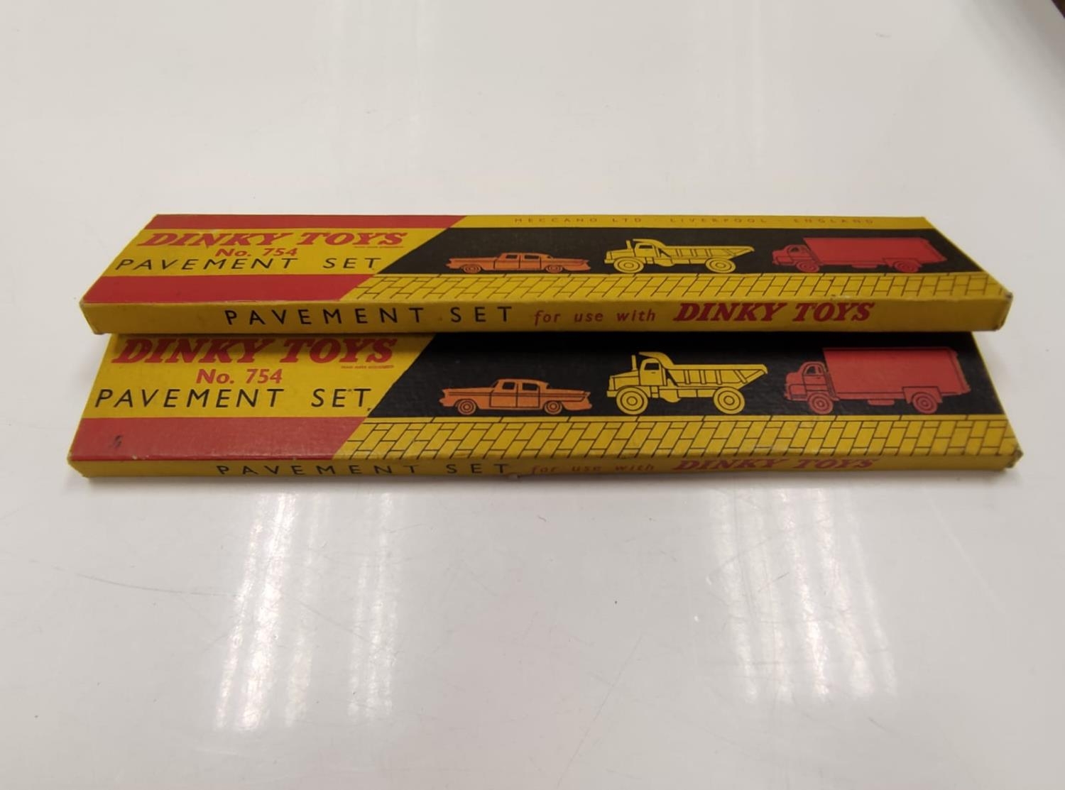 Two Dinky toys boxed pavement sets.