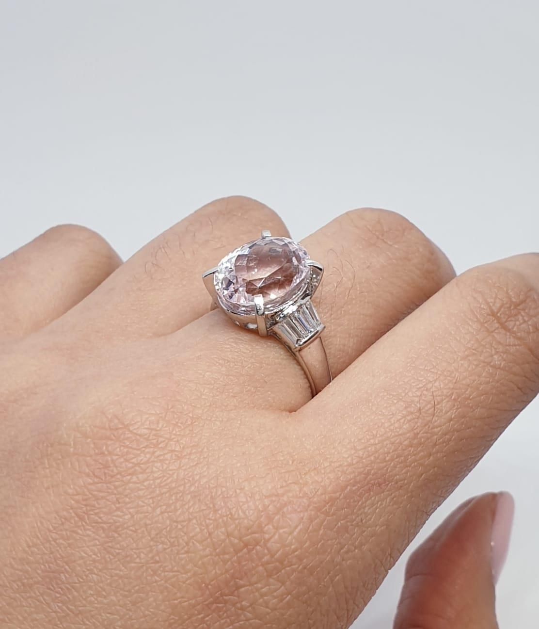 Platinum ring with a large 7.24ct cognizant stone centre and 0.64ct diamonds on shoulders, weight - Image 10 of 13