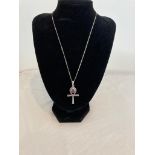 Silver Celtic cross set with large circular amethyst mounted on silver chain. Silver chain 45 cm