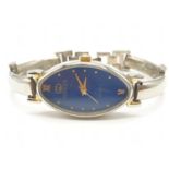 Ladies wristwatch marked Gucci Goldtime . Oval blue face model. Having quartz movement and 'gold'