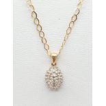 9ct gold and diamond pendant on a 42cm 9ct gold chain. 2gr