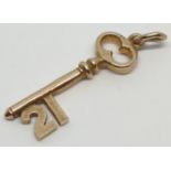 9ct Yellow gold 21 key pendant / charm. Weight 1.3g, Width 2.9cm.