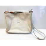 Vintage Gucci styled cream messenger bag with cream leather strap featuring wooden toggle detailing.