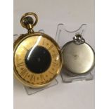 Vintage gilt Goliath pocket watch good condition and good working order ( smaller watch just for
