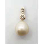Large pearl pendant set in diamond and 9ct gold, weight 3.21g and pearl size 15mm approx