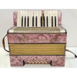 Childs Accordion, Working bellows, Missing ivory key.