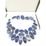 A lapis lazuli necklace and bracelet set is a presentation box. Necklace length: 50-54cm, bracelet