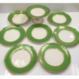 Soho Pottery ceramic set. Stylish green and gold trimmed design featuring 6 plates measuring 24cm