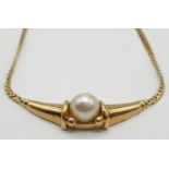 18ct Yellow gold collar necklace with a cultured pearl set. Weight 8.3g, Length 7.7cm.