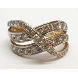 18ct Yellow gold diamond set fancy three row twist band ring. Weight 8.5g, Approx. 0.60ct of