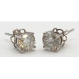Pair of 18ct white gold diamond stud earrings (2.02ct, colour H, clarity I2, W.G.I certification),