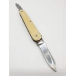 Vintage twin bladed pen knife with cream coloured casing, 8.4 cm approx.