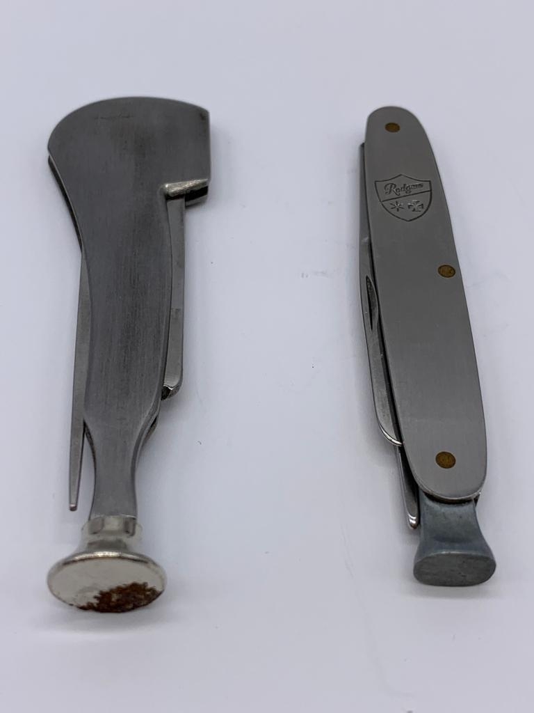 2 x Vintage stainless steel pipe smokers tools in pen knife form. One having the shape of a pipe,