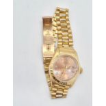 18ct gold Rolex oyster perpetual Datejust ladies watch with rose gold face and Roman numerals,