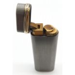 Cartier brushed silver style with two coloured gold trim lighter, full working order.