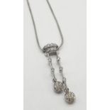 18ct White gold diamond set drop pendant on 18ct white gold snake chain. Weight 7.7g, Length 22cm.
