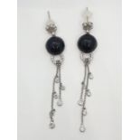 Pair of Onyx and diamond drop earrings set in 18ct gold, weight 10.13g and 7cm drop approx
