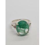 925 Silver Emerald Ring. 6.5 Cts. With Two Rose cut diamonds as accent.